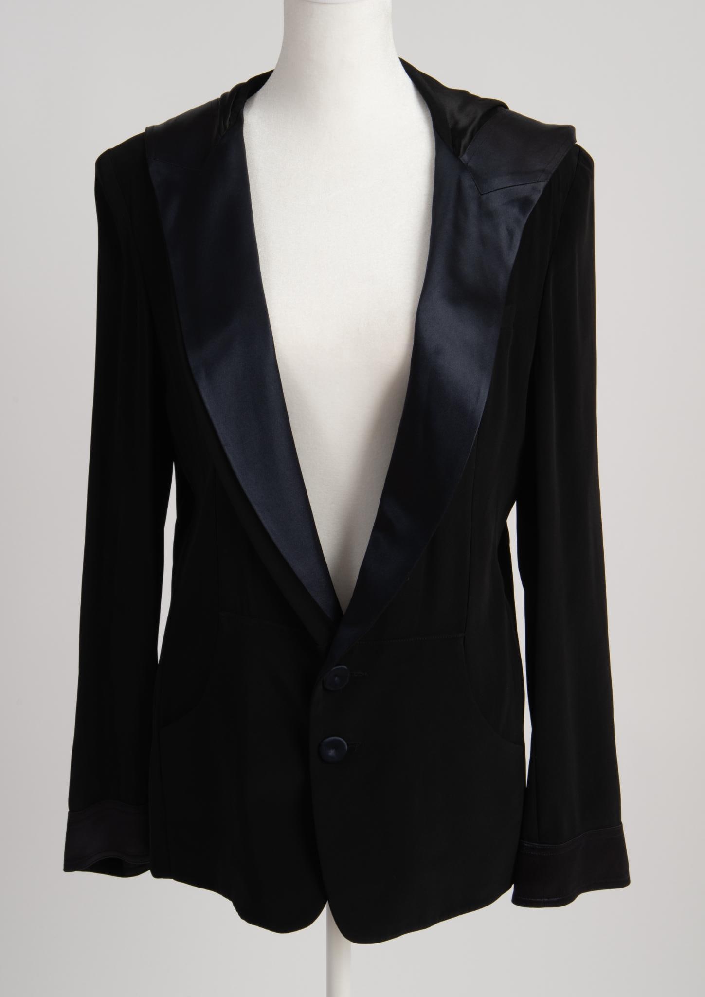 Alexis Mabille Hooded Tuxedo Blazer, 36: Size 36, black CONDITION: These are used articles, and may exhibit minor stains, wear, slight odors, and other minor defects. We have attempted to show any major damage in photographs and note it in t
