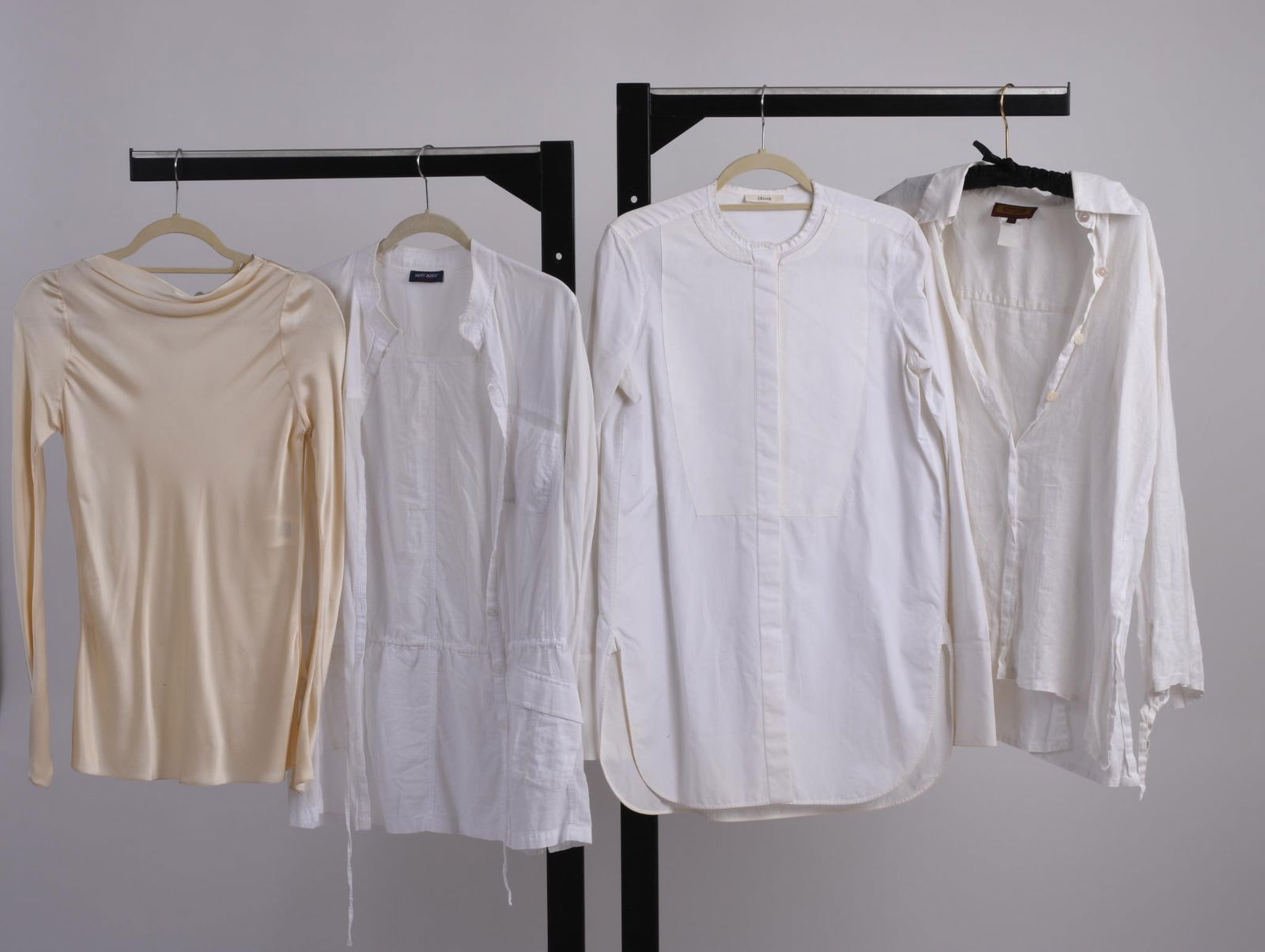 Eight Designer Cotton/Silk Blouses: Sizes Small and Medium. Designers include: Renato Nucci, Celine, Saint James, Yves Saint Laurent, Givenchy, Thierry Mugler, Dolce & Gabbana, Jean Paul Gaultier CONDITION:These are used articles, a