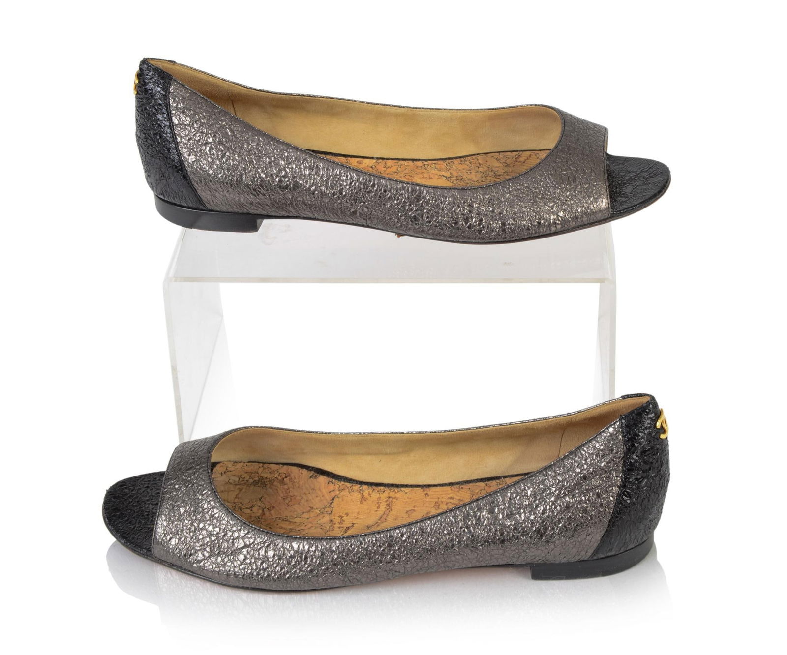 Chanel Grey and Black Flats, 40: Size 40 CONDITION:These are used articles, and may exhibit minor stains, wear, slight odors, and other minor defects. We have attempted to show any major damage in photographs and note it in the descr