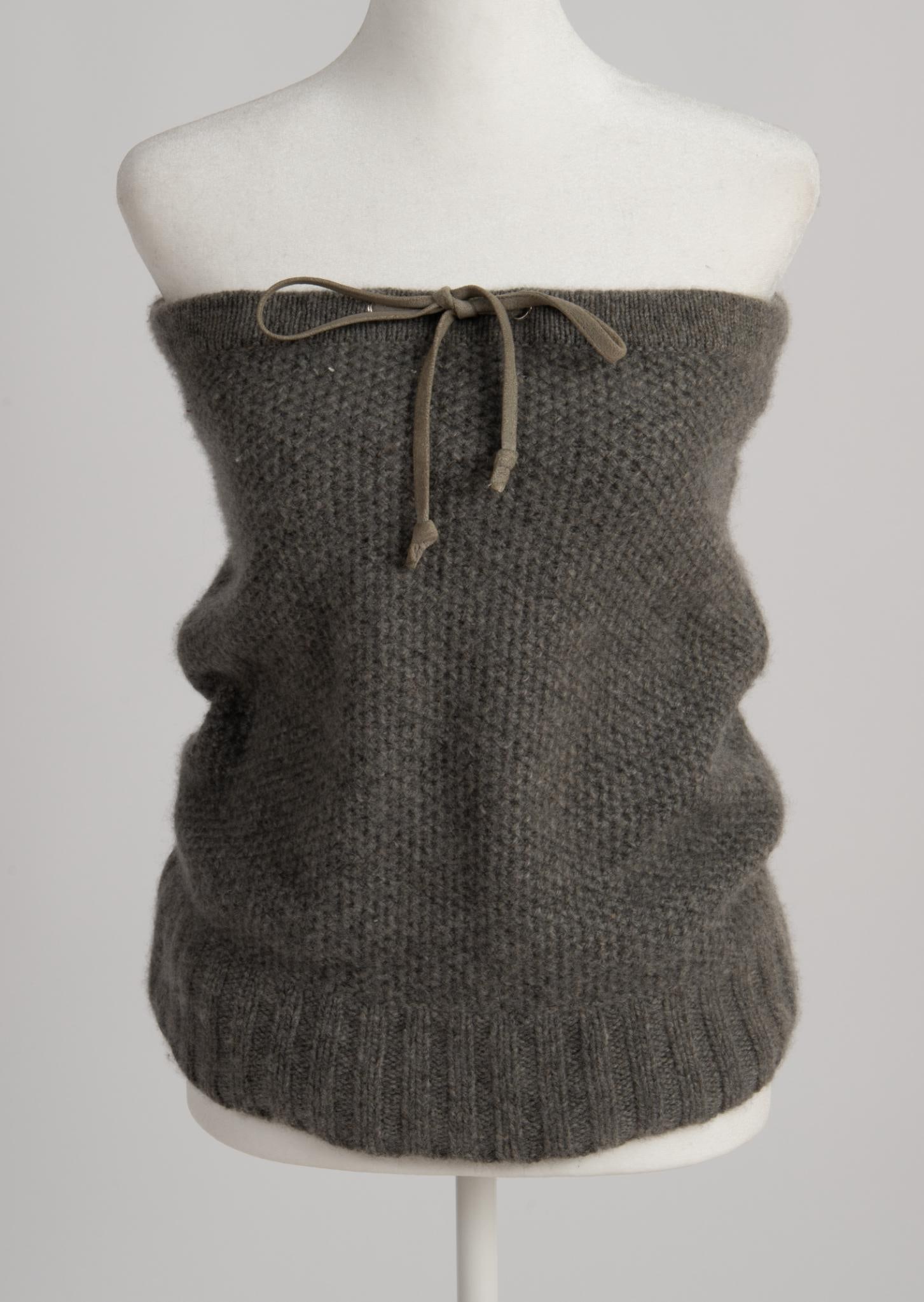 Rag & Bone Cashmere Scarf with drawstring: Grey one size fits all. CONDITION: These are used articles, and may exhibit minor stains, wear, slight odors, and other minor defects. We have attempted to show any major damage in photographs and not