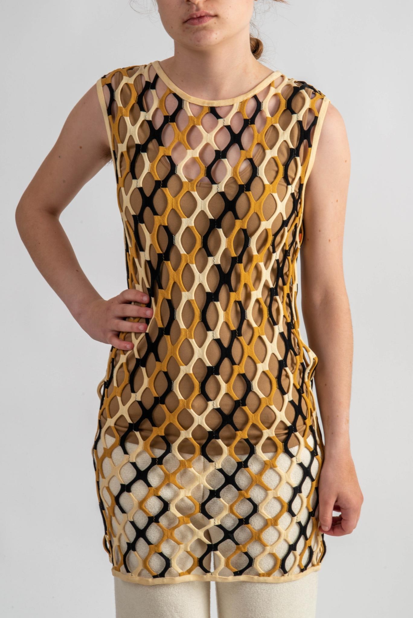 Missoni Cutout Dress, 8-10: Size 8-10, black, white, and camel color CONDITION:These are used articles, and may exhibit minor stains, wear, slight odors, and other minor defects. We have attempted to show any major damage in pho
