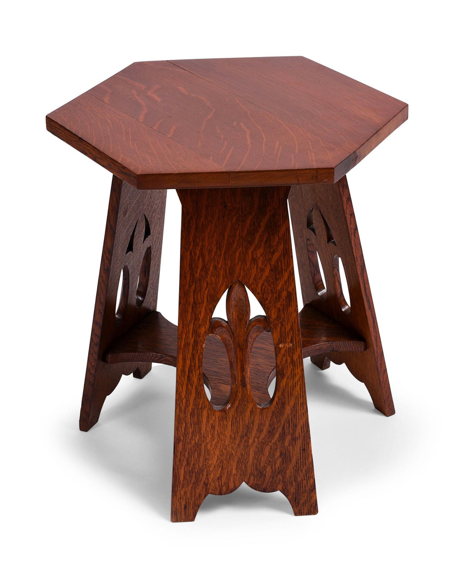 Stickley Brothers Mission Oak Tabouret.: Model No. 111, Hexagonal top, three slab legs with cutout leaf motif, c. 1902. Height 18.5 inches, top 15.5 x 17.5 inches.