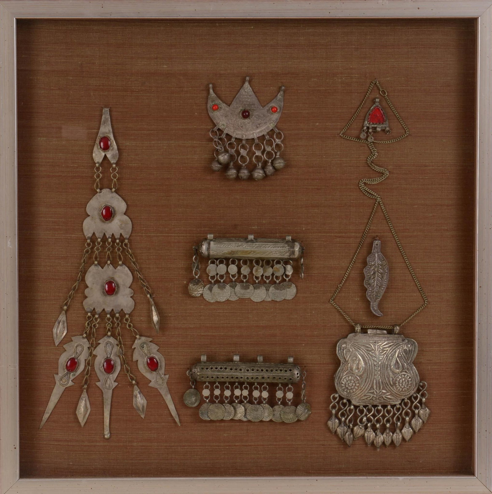 Vintage Tibetan Framed Ceremonial Jewelry.: 7 pieces, frame 19.5 x 19.5 inches.