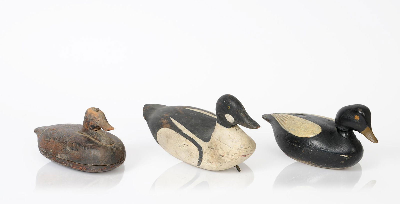 Three Carved and Painted Duck Decoys. (1 of 4)