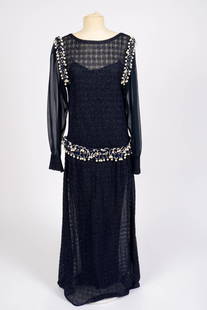 Chanel Navy Blue Drop Waist Dress.: Size 40. Some wear to shell. Shell is cotton blend, slip is silk. Length 58 inches.