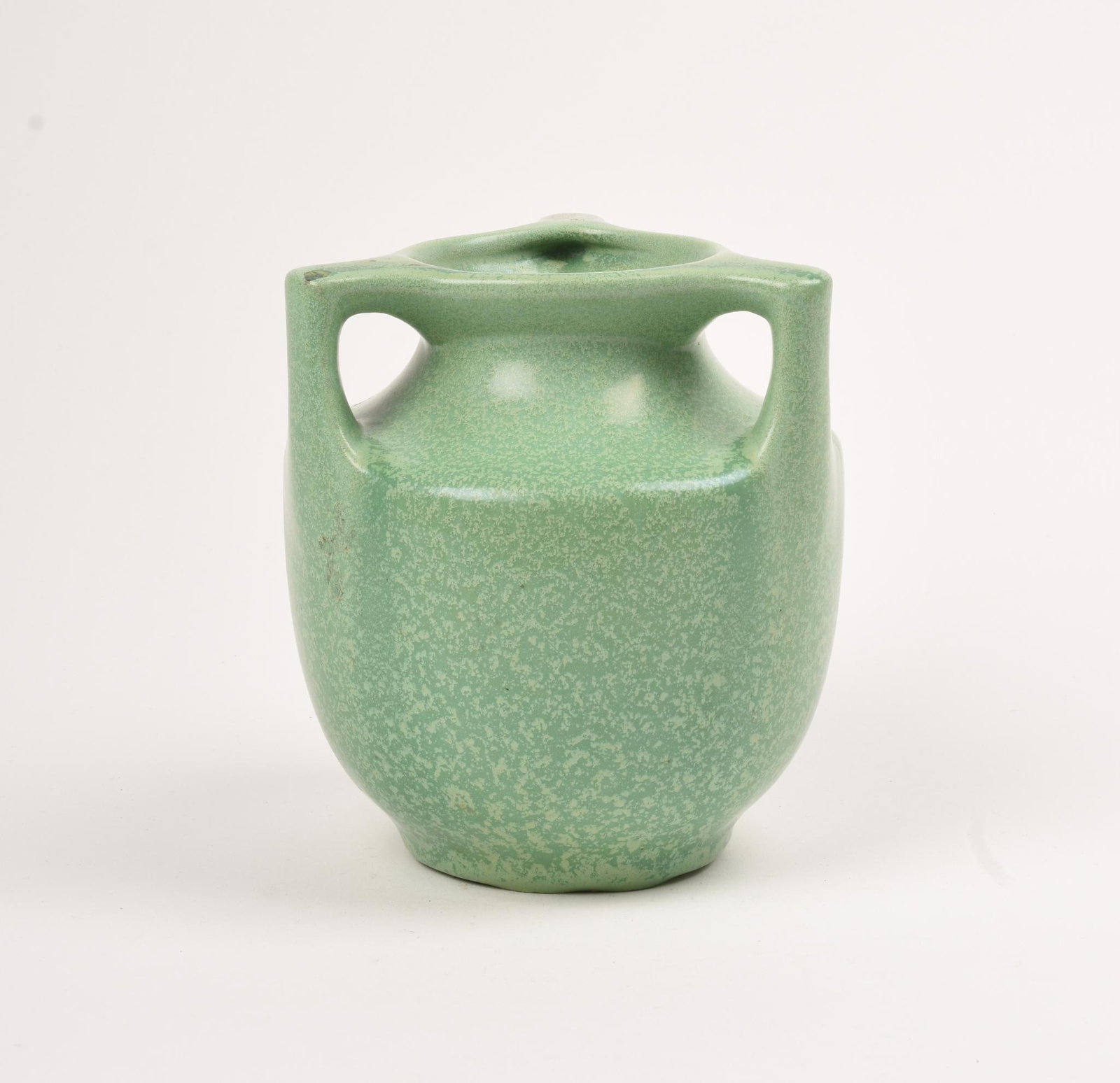 Art Pottery Vase in Green Glaze.: Height 5.5 inches. One small glaze pop, condition otherwise excellent.