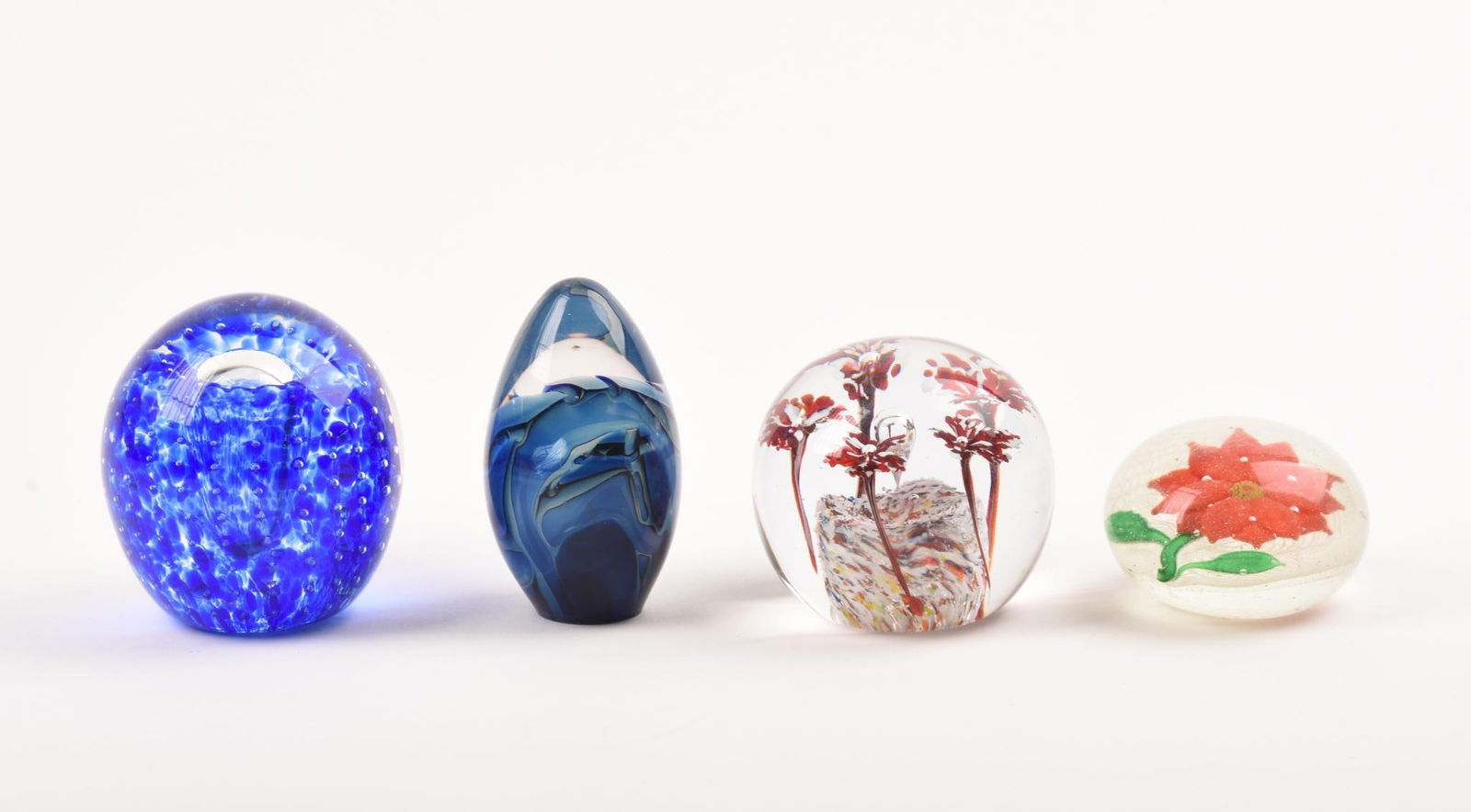Four Art Glass Paperweights. (1 of 5)