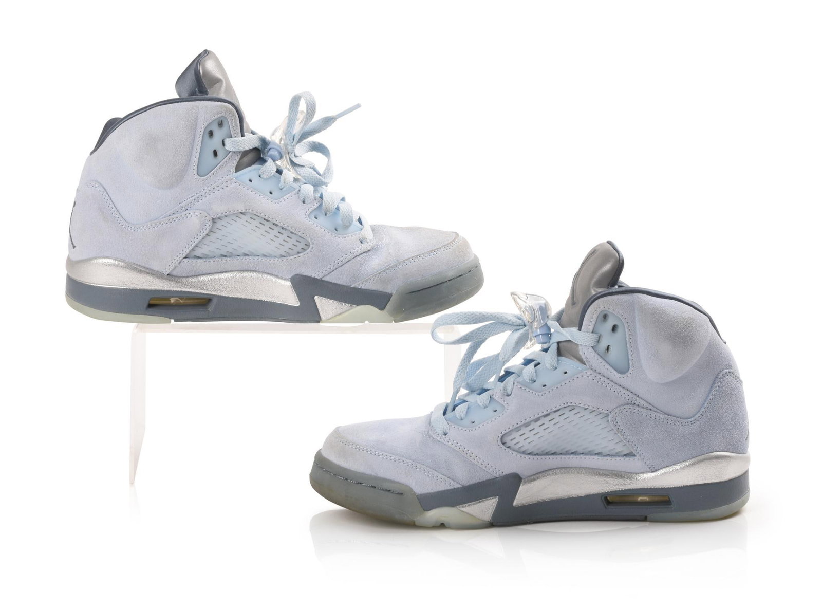 PAIR ICE BLUE WOMENS AIR JORDAN 5 RETRO.: Size 8.5. Condition almost like new. Comes with original box.