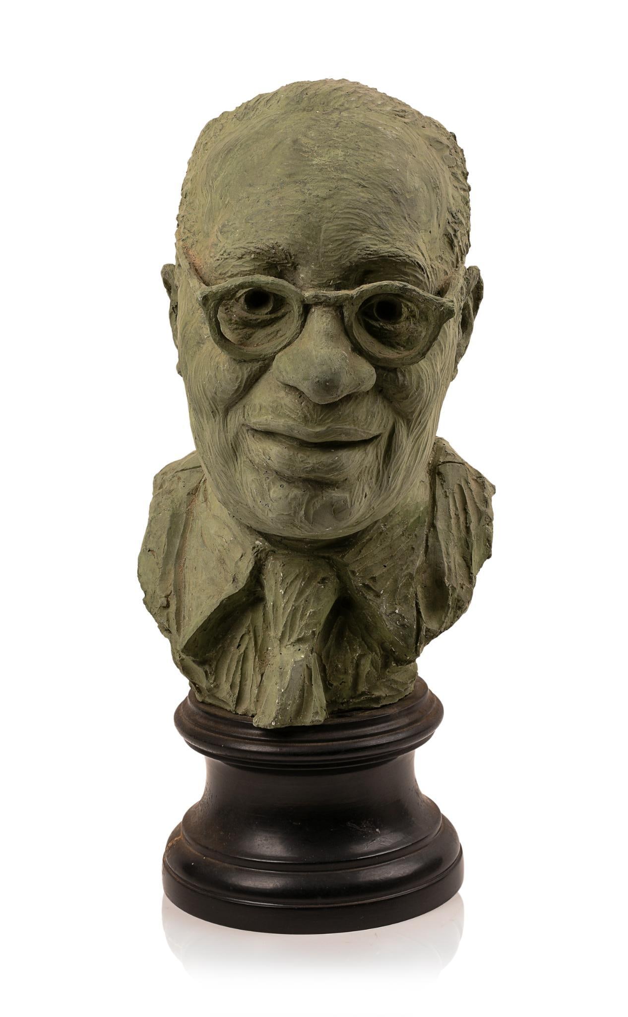HARRY MARINSKI (1909-2008) BUST OF A MAN.: Clay, on a wooden base, signed and dated 1951 at verso, height 18 inches.