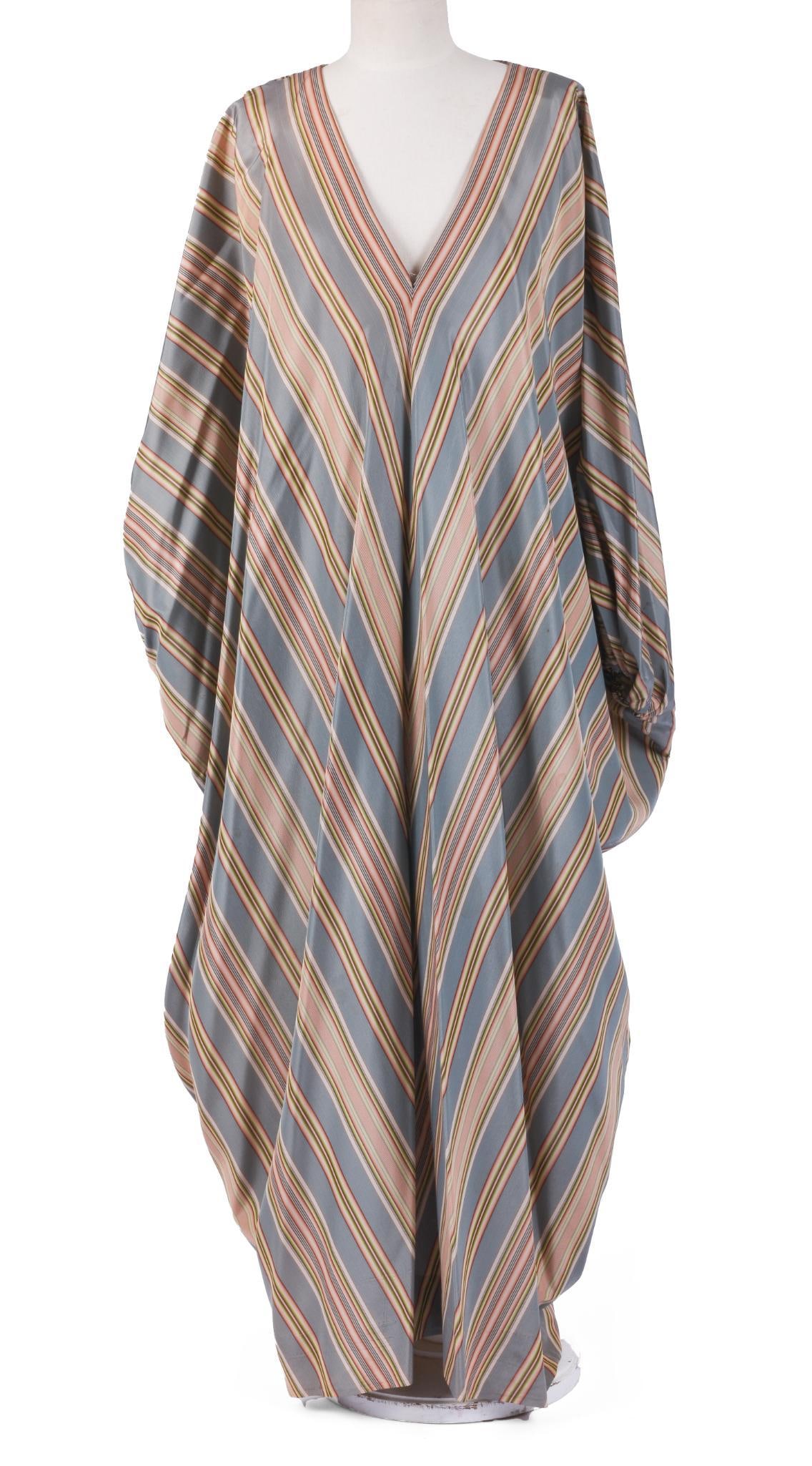 PULL OVER SILK STRIPED V NECK TUNIC: With elastic arm openings, length 56 inches