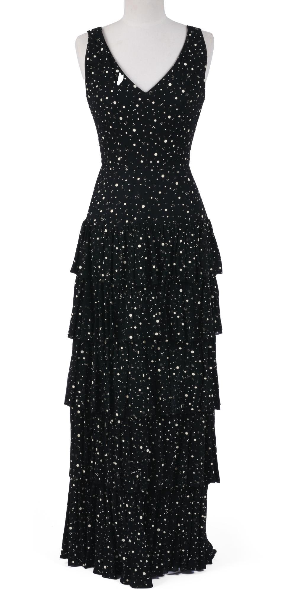 BLACK SILK MULTI TIERED EVENING GOWN, APPEARS TO BE A SIZE 4: With v neckline and embellished with white dots, length 58 inches