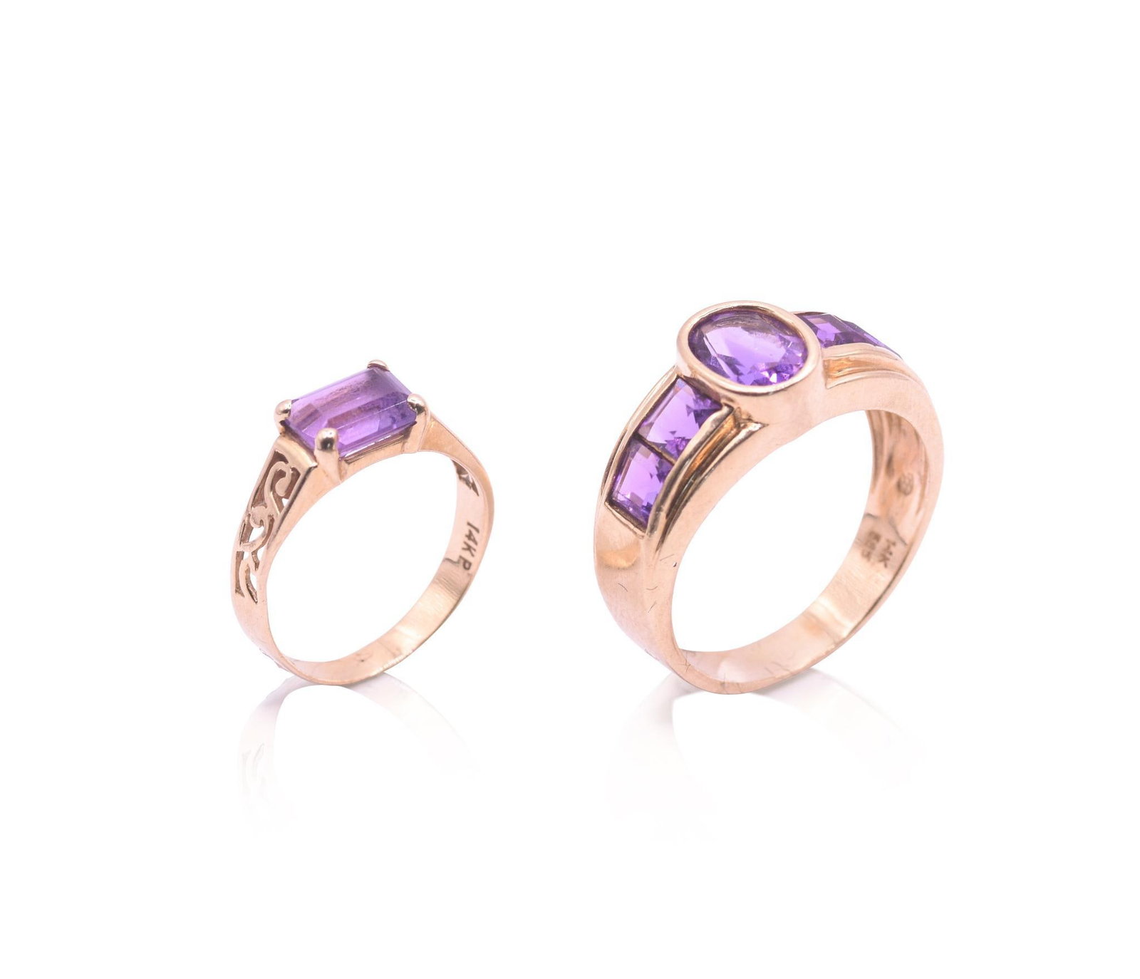 TWO 14K AND AMETHYST RINGS: Size 4 and size 8.25, stone heights 9.18mm and 5.16mm, 6.1 grams
