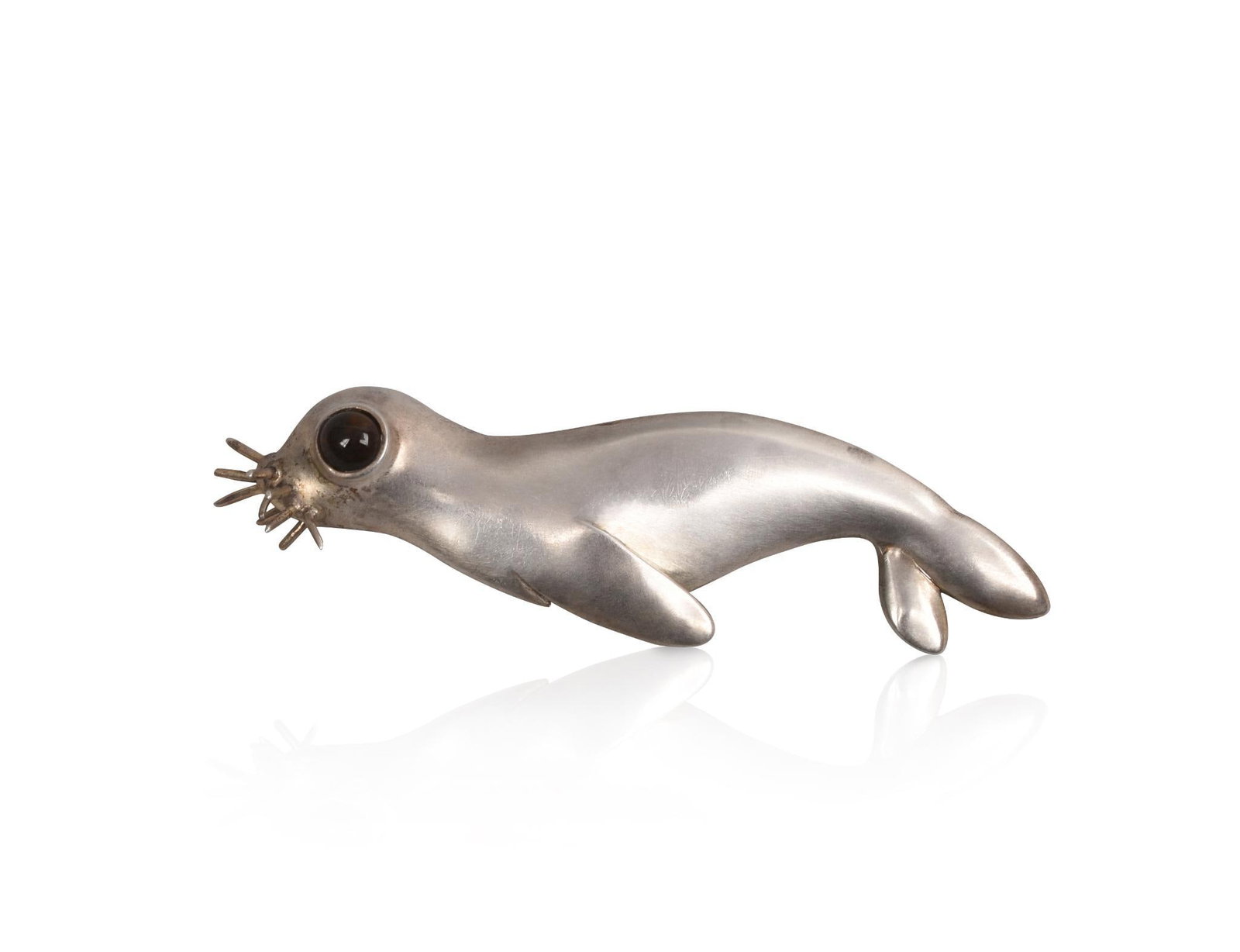 Clifford Russell Sterling Seal Pin: Maine, glass or hard stone eye, signed, length 3 inches.