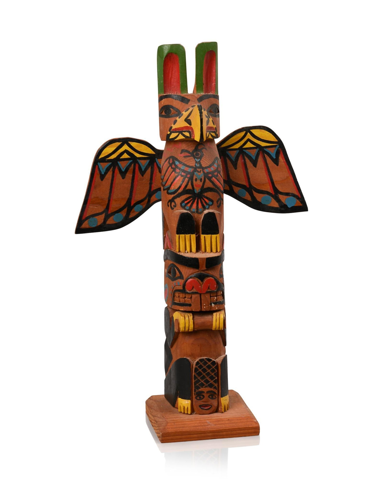 Carved and Painted Northwest Coast Totem.: Height 14.5 inches, pencil signed at back.