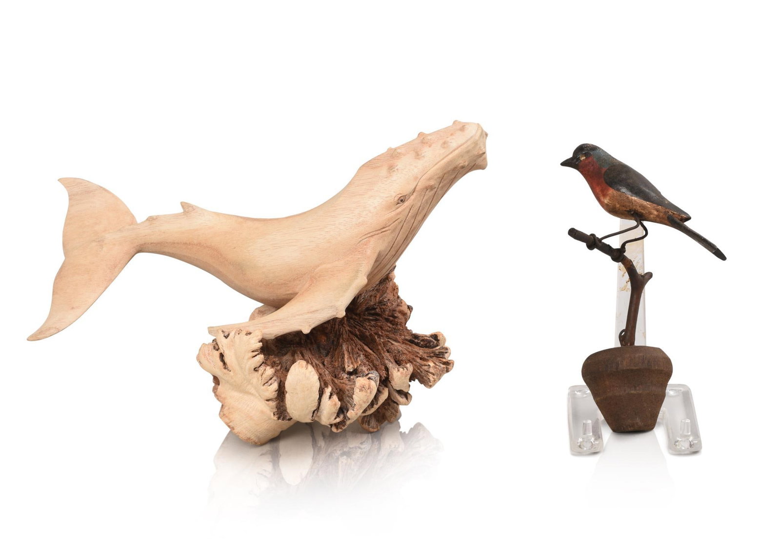 TWO CARVED WOODEN FIGURES: WHALE AND A BIRD: Whale on drift wood base signed Ida Putu Tamuc Mas and bird hand painted on branch perch, whale height 7 inches