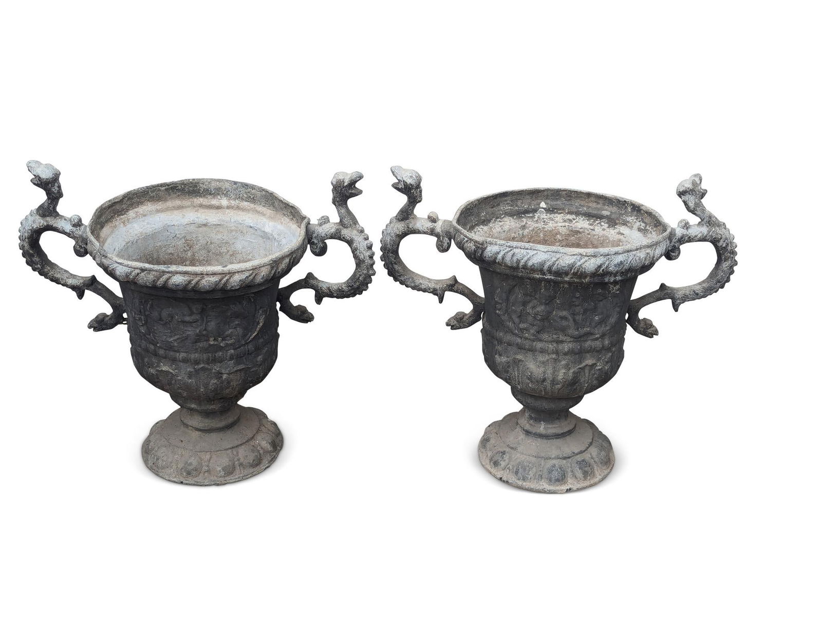 PAIR OF EUROPEAN CAST LEAD URNS. (1 of 3)