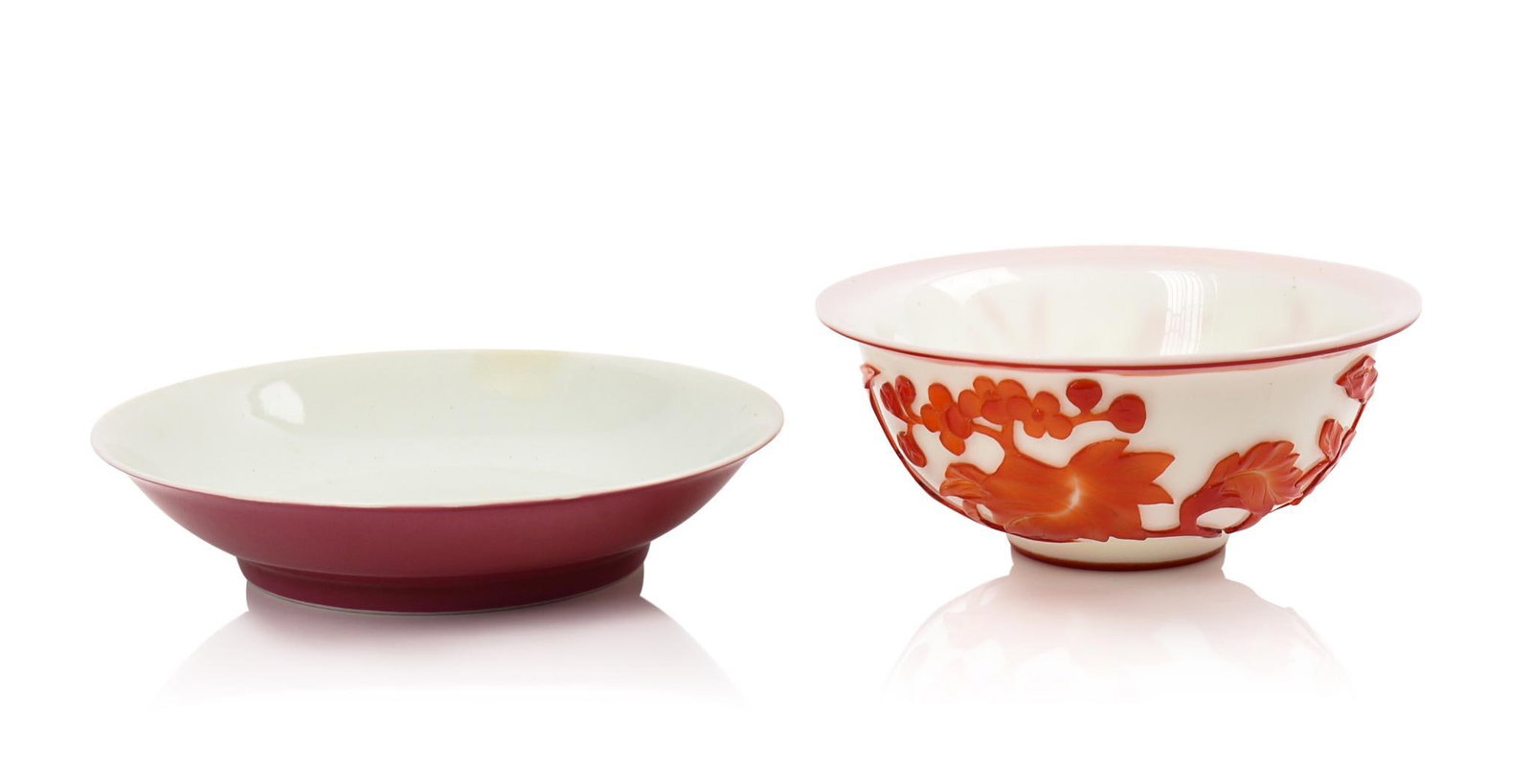 Two Chinese Bowls, Late 19th or Early 20th Century.: One purple, diameter 8 inches, 6 character mark, small chip at rim. The other a Peking glass bowl, diameter 7 inches.