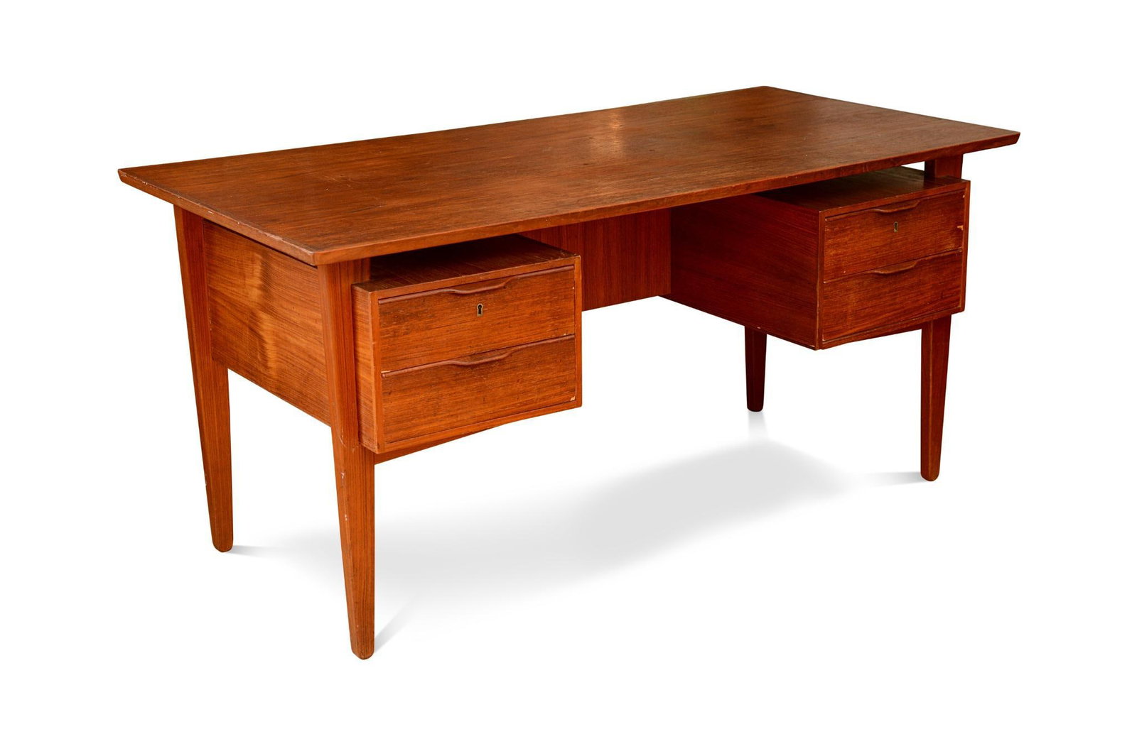 Teak Desk by Henning Jorgensen for Fredericia Mobelfabrik: Circa 1960, height 28.25 inches, width 59.5 inches, depth 30 inches. Some loss to veneer on drawers, minor surface scratches.