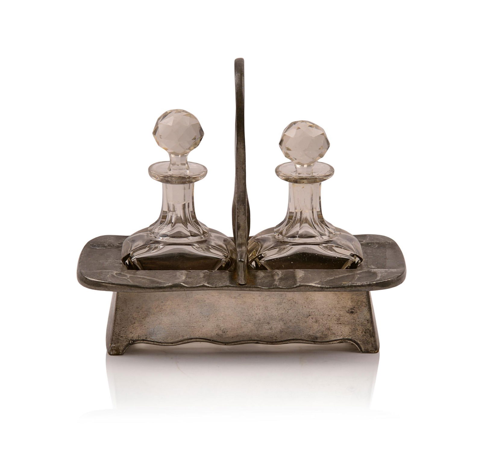Hugo Leven for Kayserzinn Pewter Cruet Set.: Art Nouveau pewter frame with original oil and vinegar bottles and stoppers, Germany c. 1900, signed Kayserzinn 4542. Height 6.5 inches.