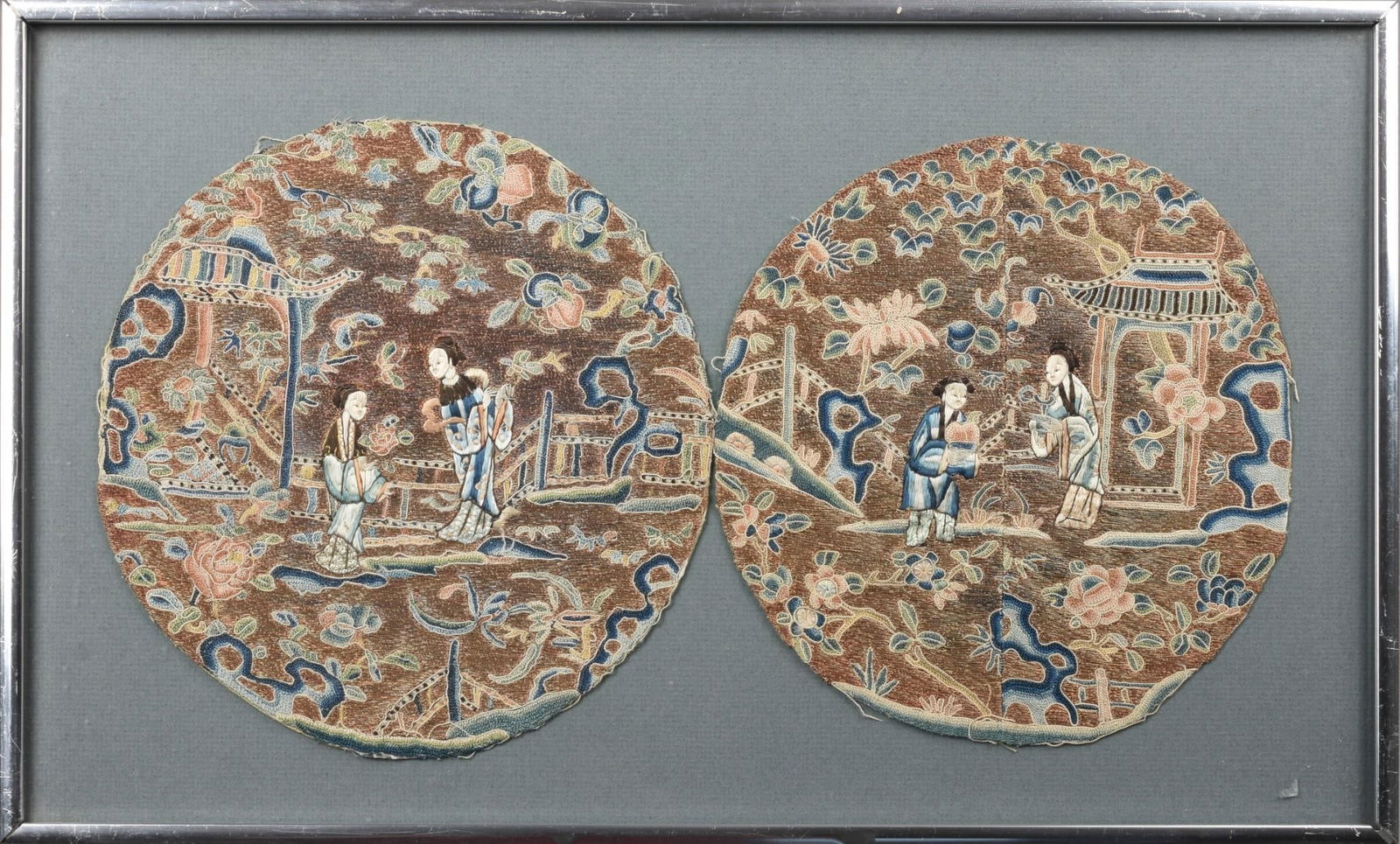 Two Chinese Embroidered Silk Roundels: Each with 2 Chinese ladies outside a pavilion, mostly embroidered in forbidden stitch against a gilt thread ground, 19th century, framed, 12.25 inches x 20.25 inches