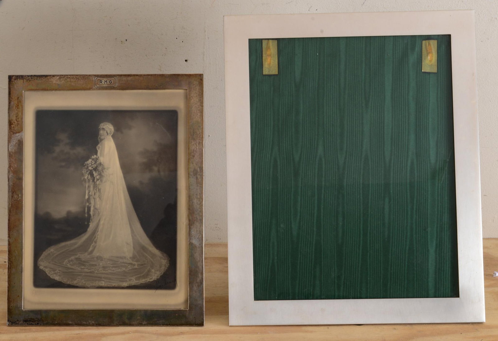 Tiffany & Co Sterling Silver Picture Frame.: For an 8.5 x 11 inch image, together with an unmarked frame for a 12 x 15 inch image.