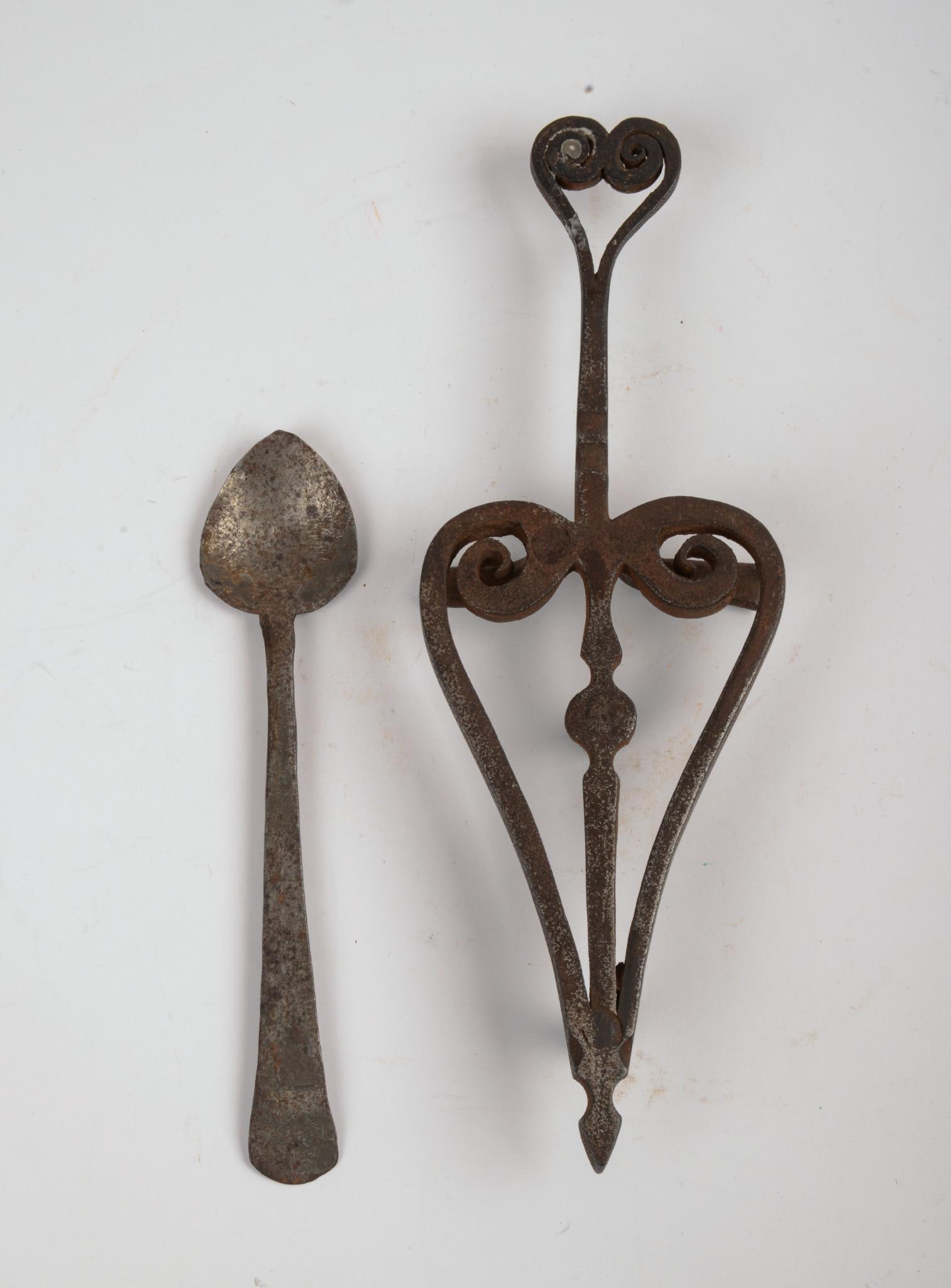 18th Century Wrought Iron Trivet and a Spoon: Length of trivet 9.5 inches.