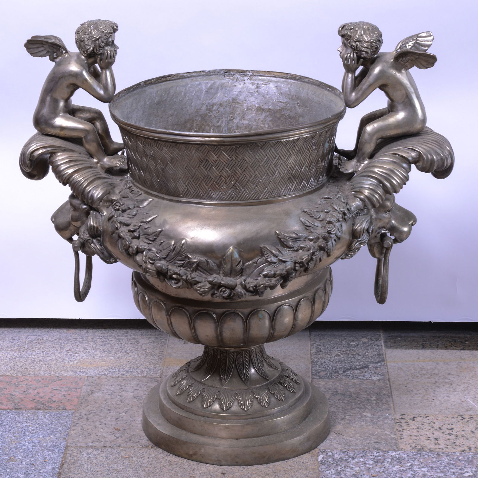 Large Metal Urn With Cherubs and Lions. (1 of 4)