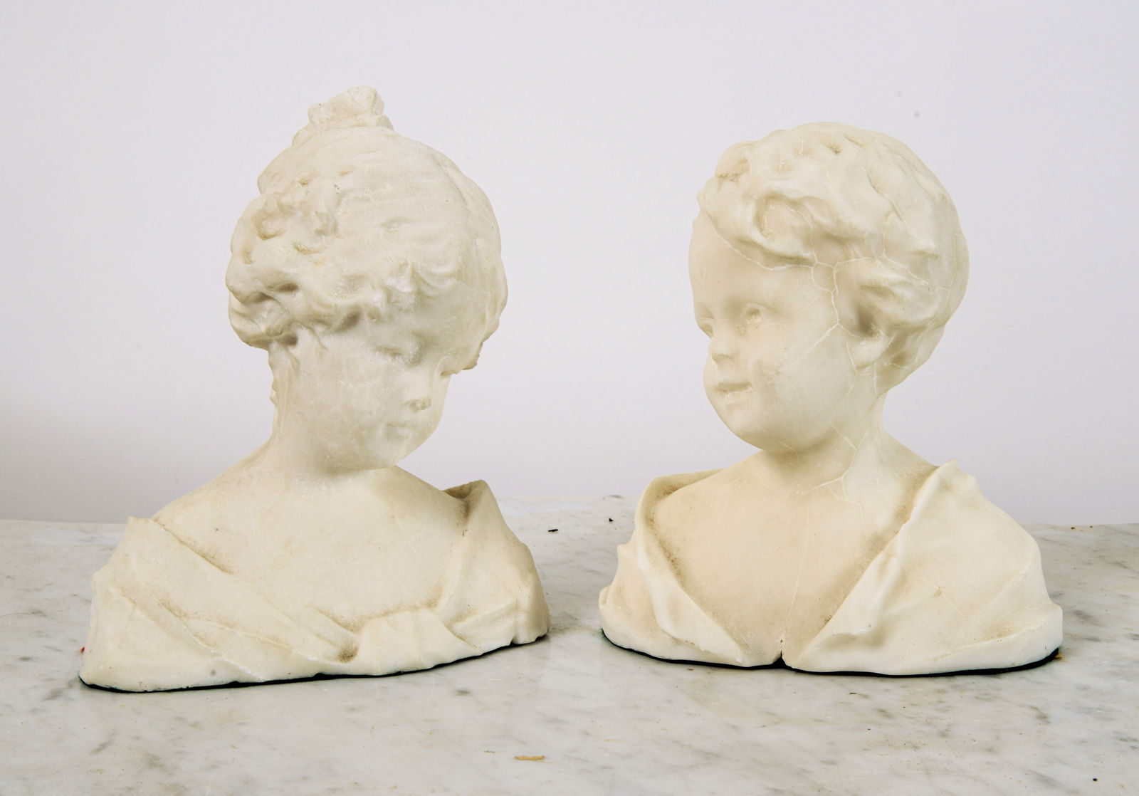Pair of Carved Soapstone Busts of Children. (1 of 4)