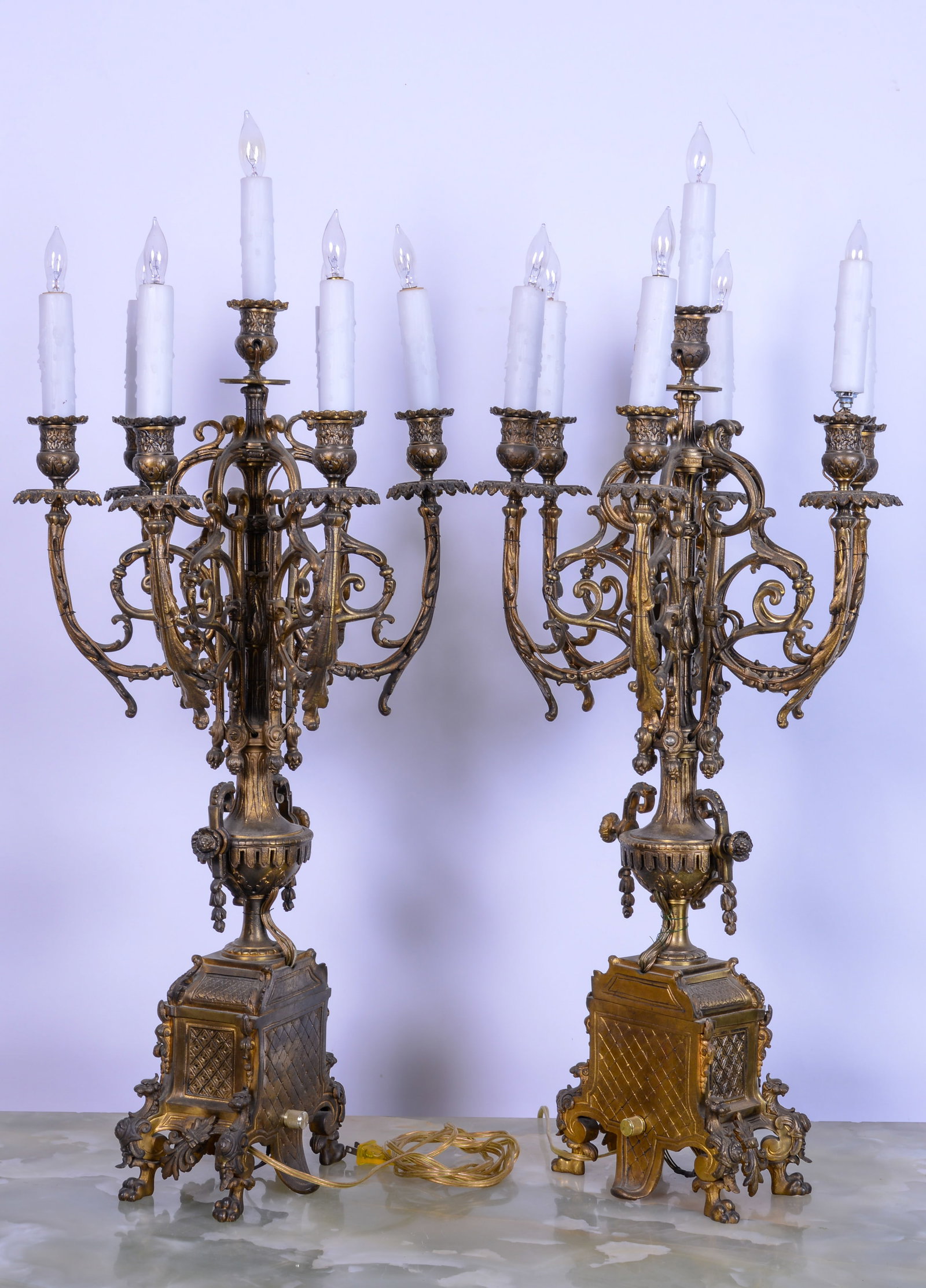 Pair of Gilt Metal Rococo Seven Light Candelabra.: Height 34.5 inches, width 15 inches. Fitted for electricity, Wiring appears intact, all electrical fixtures are sold as is. "SHIPPING In house shipping is available for this item. Please allow 1-2 wee