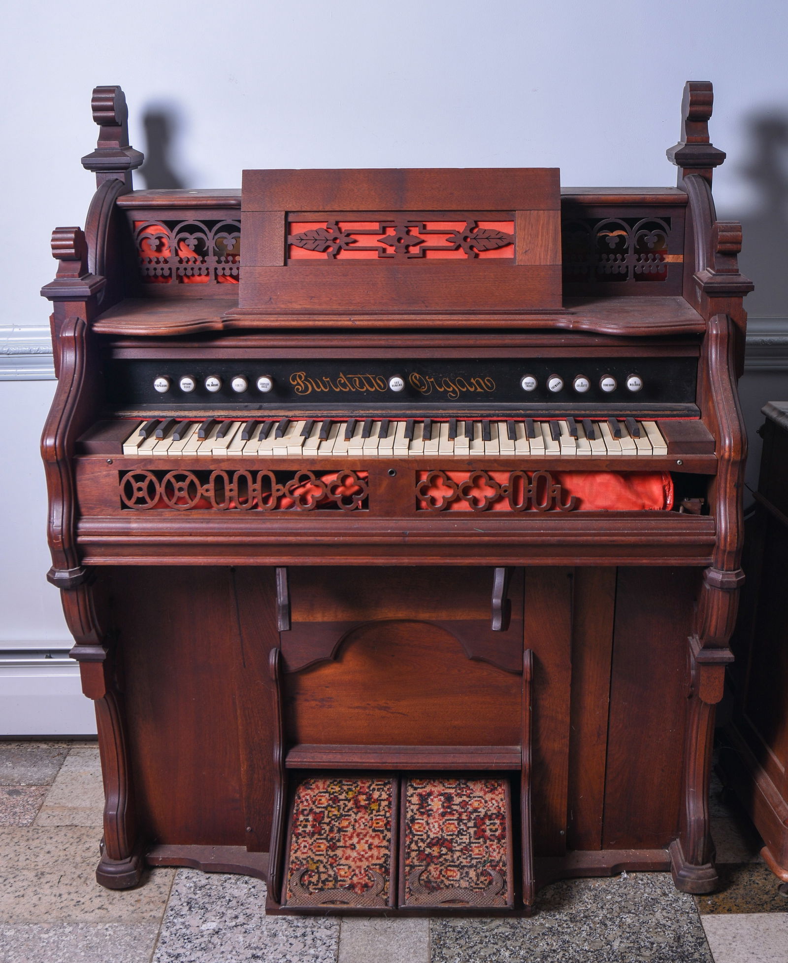 Burdett Pump Organ.: Height including finials 53.5 inches, width 44.25 inches, depth 22.5 inches. Keys are stuck, some damage to front of case. "DELIVERY Delivery via private trucking company is available for this item. P