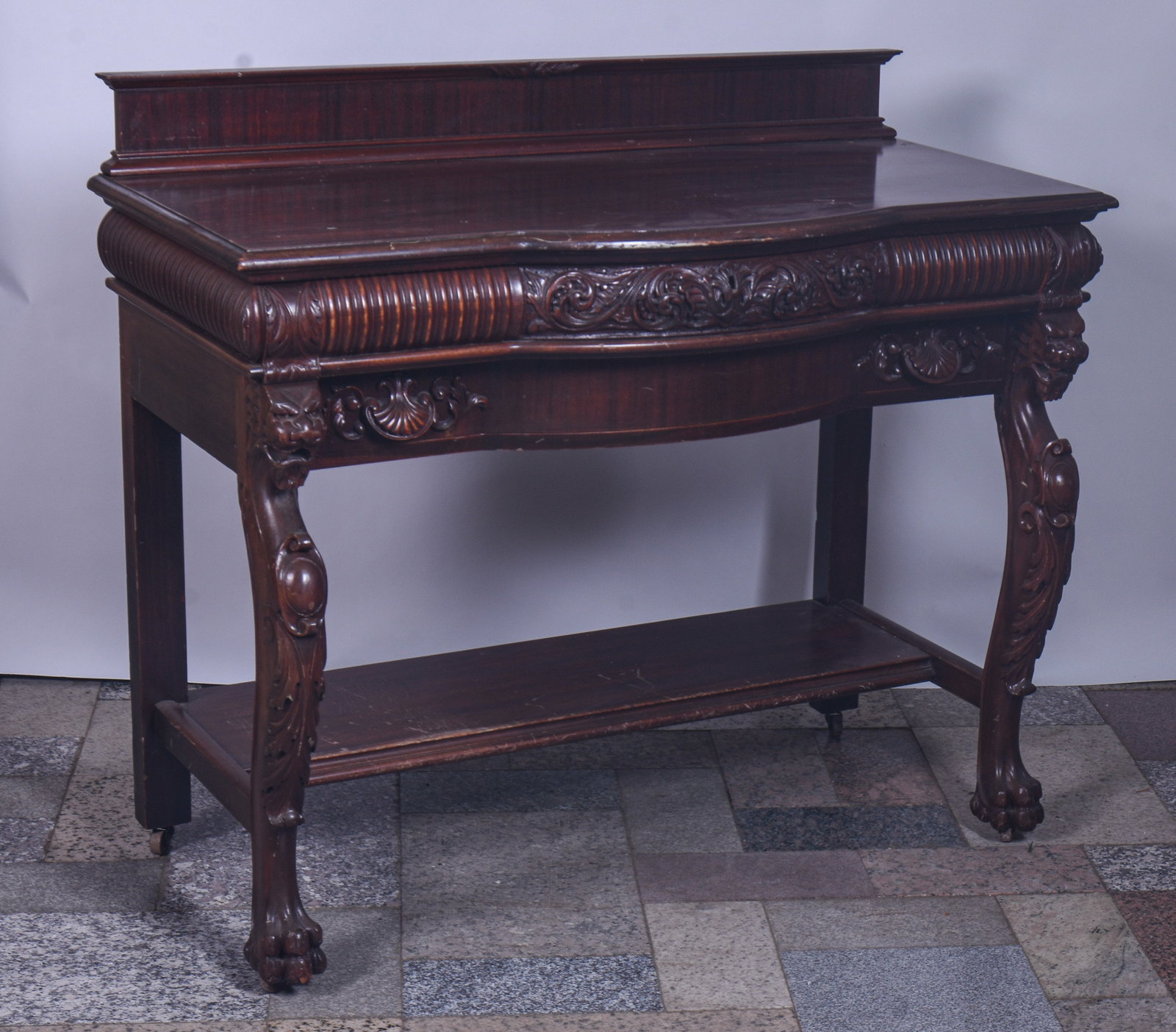 Gothic Revival Pier Table.: Height 40 inches, table height 35 inches, width 46 inches, depth 24 inches. Surface scratches, table is solid and usable. "DELIVERY Delivery via private trucking company is available for this item. Pl