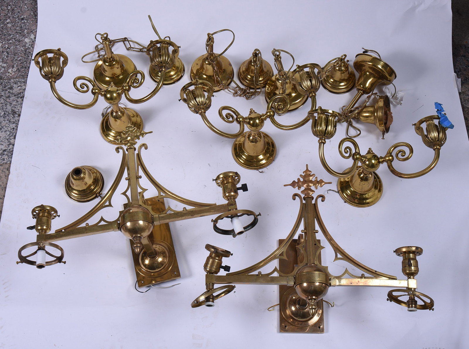 Brass Lighting.: A pair of sconces, width 22 inches, set of three, width 16 inches, and several hanging lamps. "NO SHIPPING AVAILABLE. PICKUP Pickup is November 3 and 4 ONLY at Nestlenook Farm, 70 Dinsmore Rd, Jackson