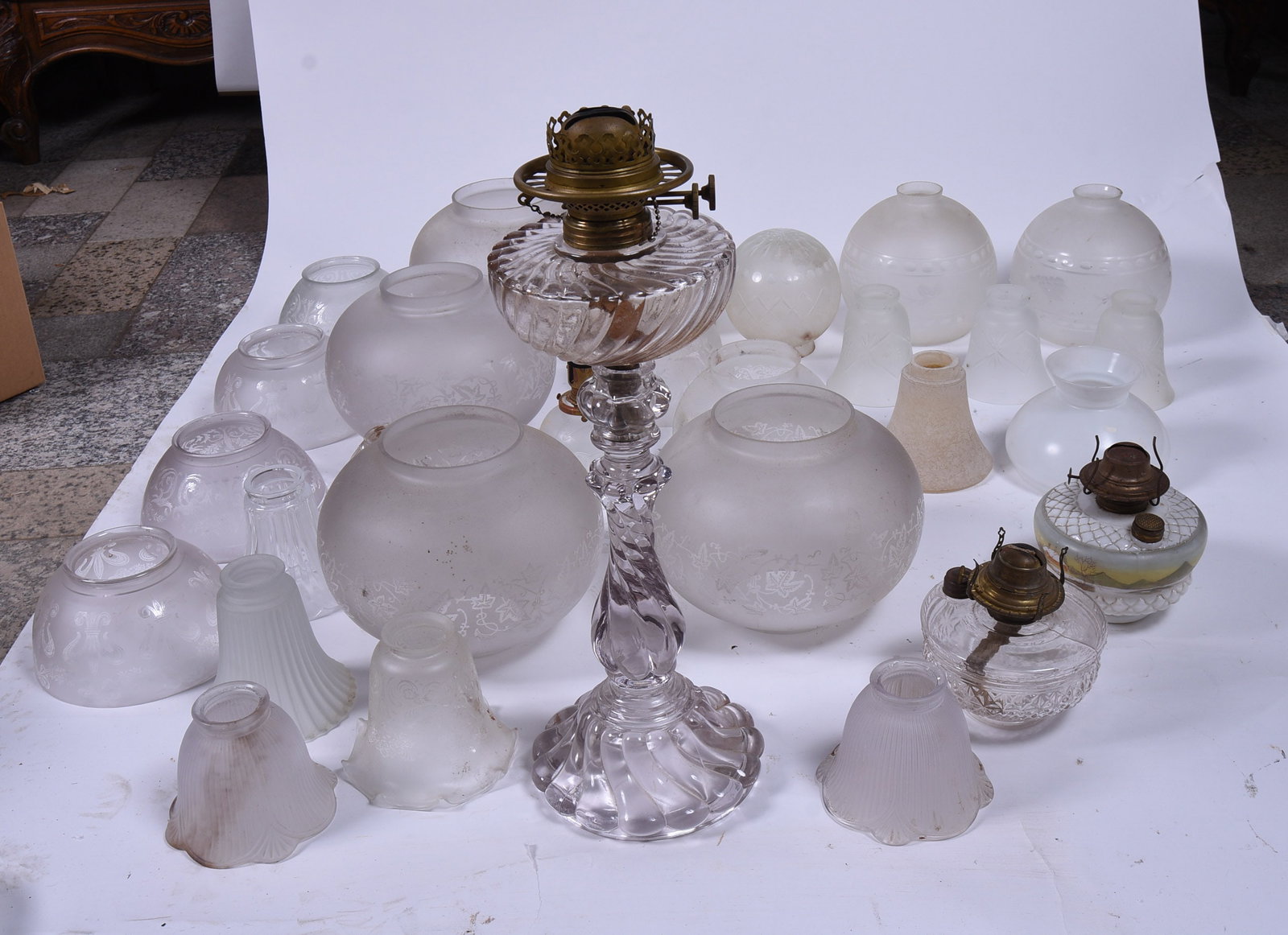 Large Collection of Glass Shades and Lamps: See photos for details. "NO SHIPPING AVAILABLE. PICKUP Pickup is November 3 and 4 ONLY at Nestlenook Farm, 70 Dinsmore Rd, Jackson, NH 03846. Items not picked up during this time will be forfeited wit