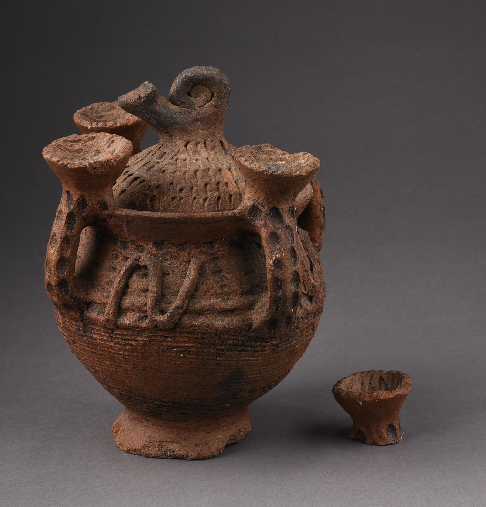 IGBO NIGERIA STORAGE JAR: Height 8 inches. One broken section.
