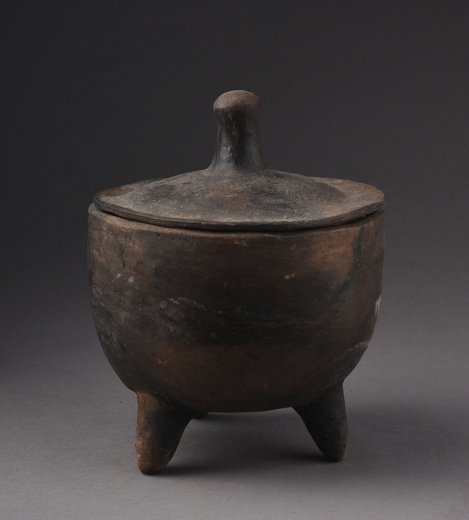 FOOTED CLAY BOWL, HAUSA, NIGERIA: Overall height 7.5 inches.