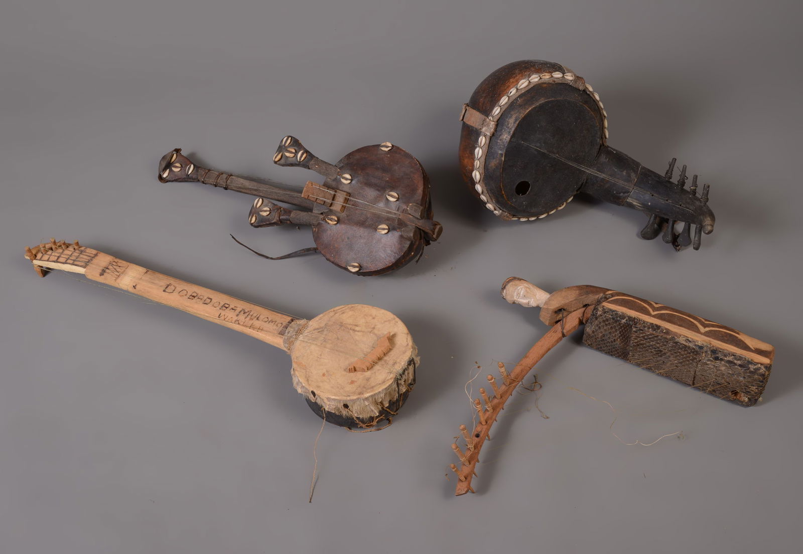 FOUR MUSICAL INSTRUMENTS FROM GABON (1 of 7)