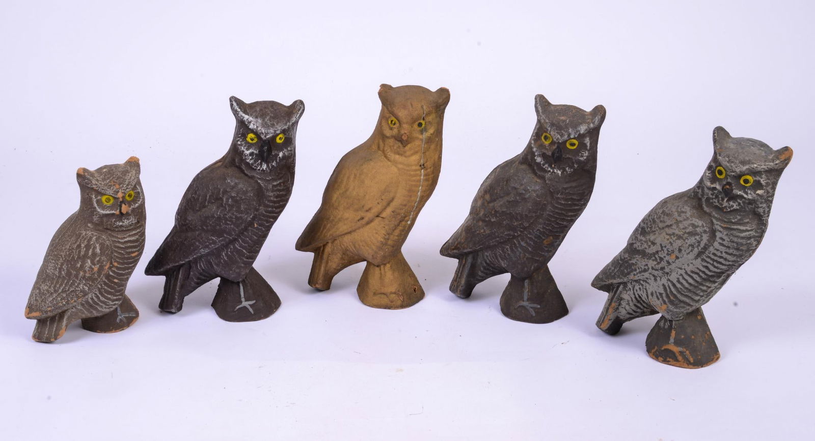 Five Sideways Facing Owl Decoys.: Unknown factory, tallest height 13 inches