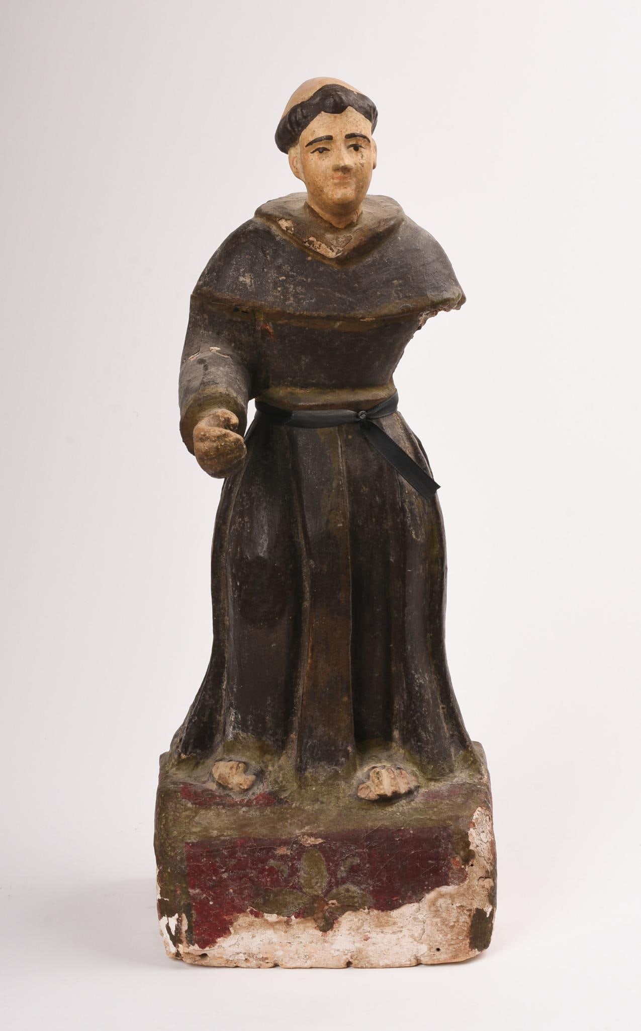 Mexican Carved and Painted Wood Santos Figure C. 1900: St. Anthony, height 16.5 inches, loss of 1 arm, damage to back corner and loss to paint