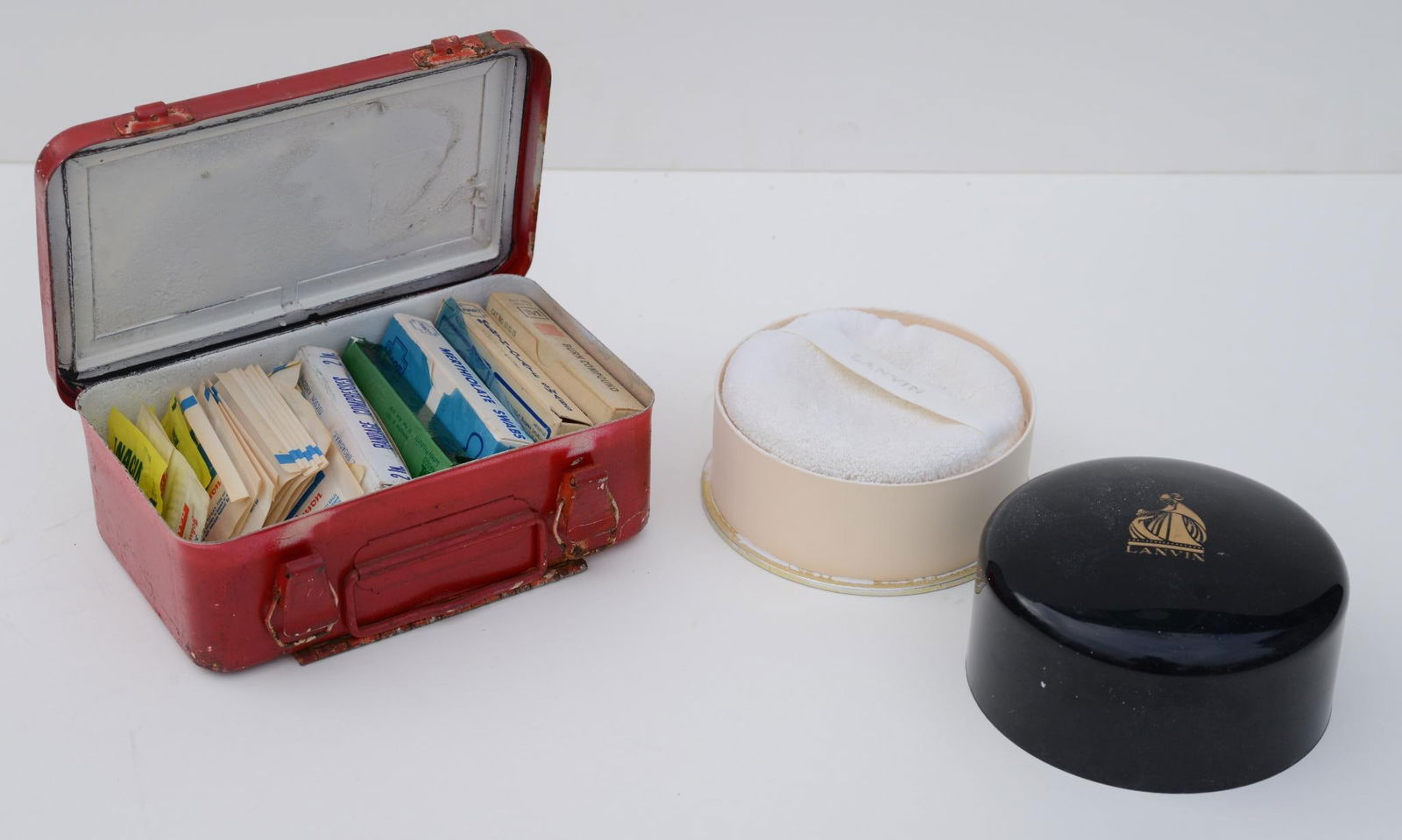 Vintage First Aid Kit in Metal Box: With vintage Lanvin dusting powder, width of kit 8 inches