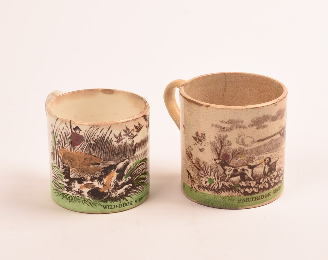 Two 19th Century Transferware Cups: Depicting hunting scenes, 'Partridge Shooting' and 'Wild Duck Shooting', larger cup height 2.5 inches, crazing and staining