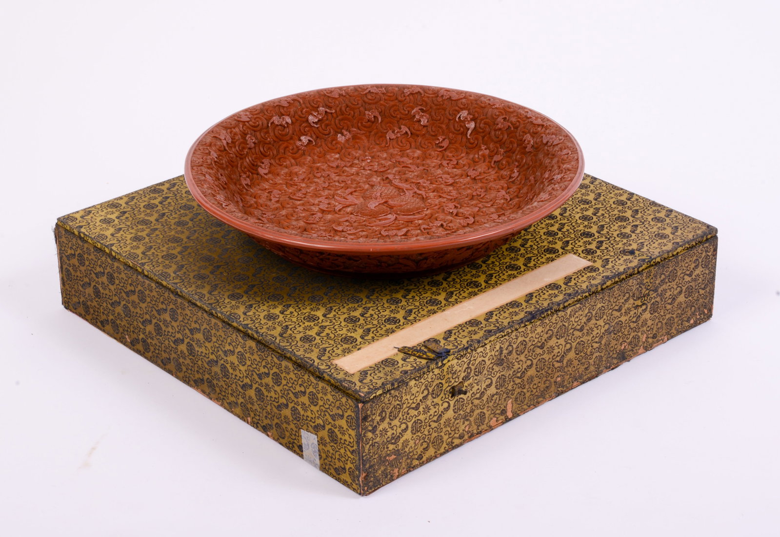 Chinese Cinnabar Carved Bowl With Bats, Flowers and Foliage: In original box, diameter 13.25 inches