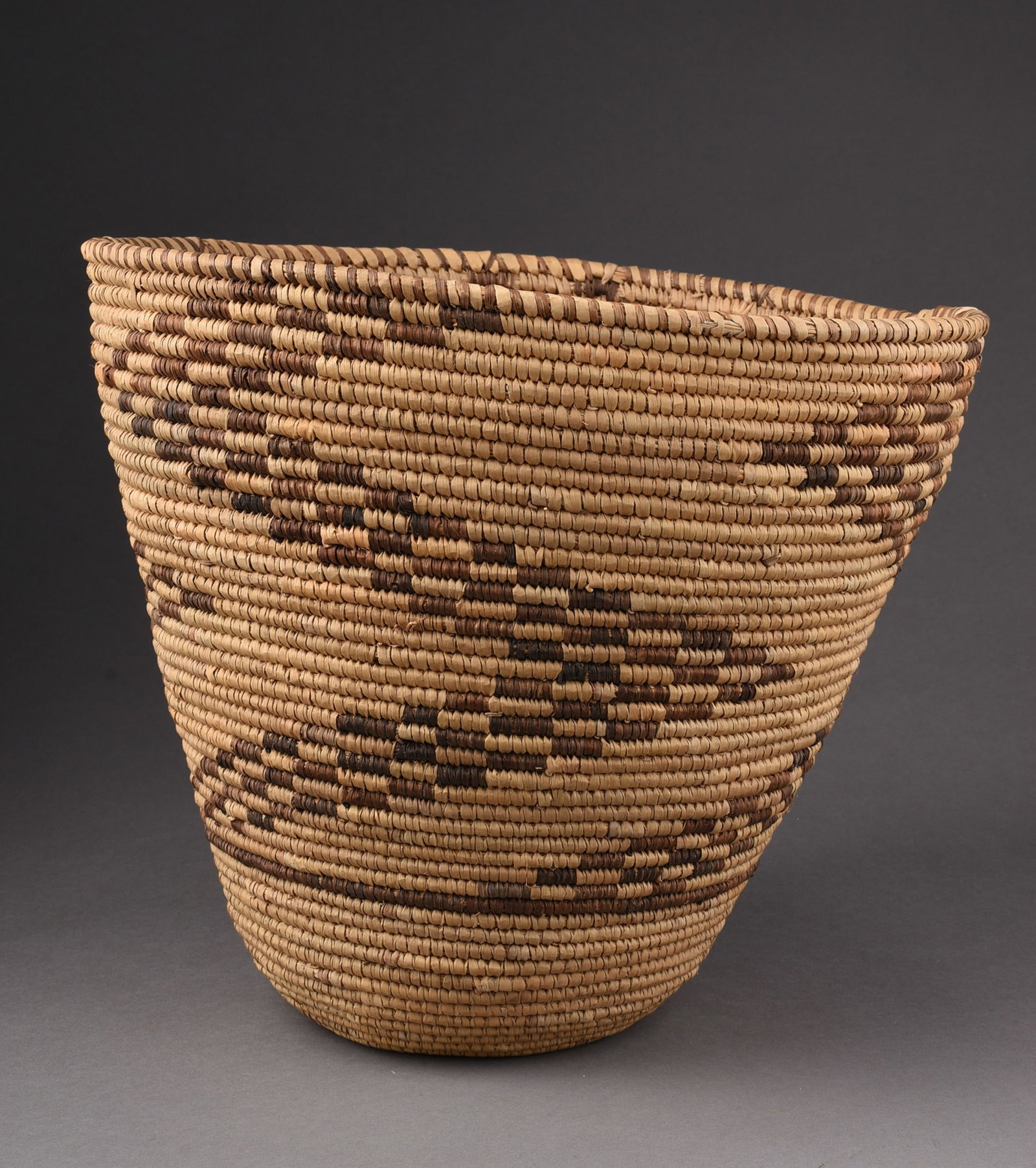 ZIMBABWE WOVEN BASKET: Height 9.25 inches.