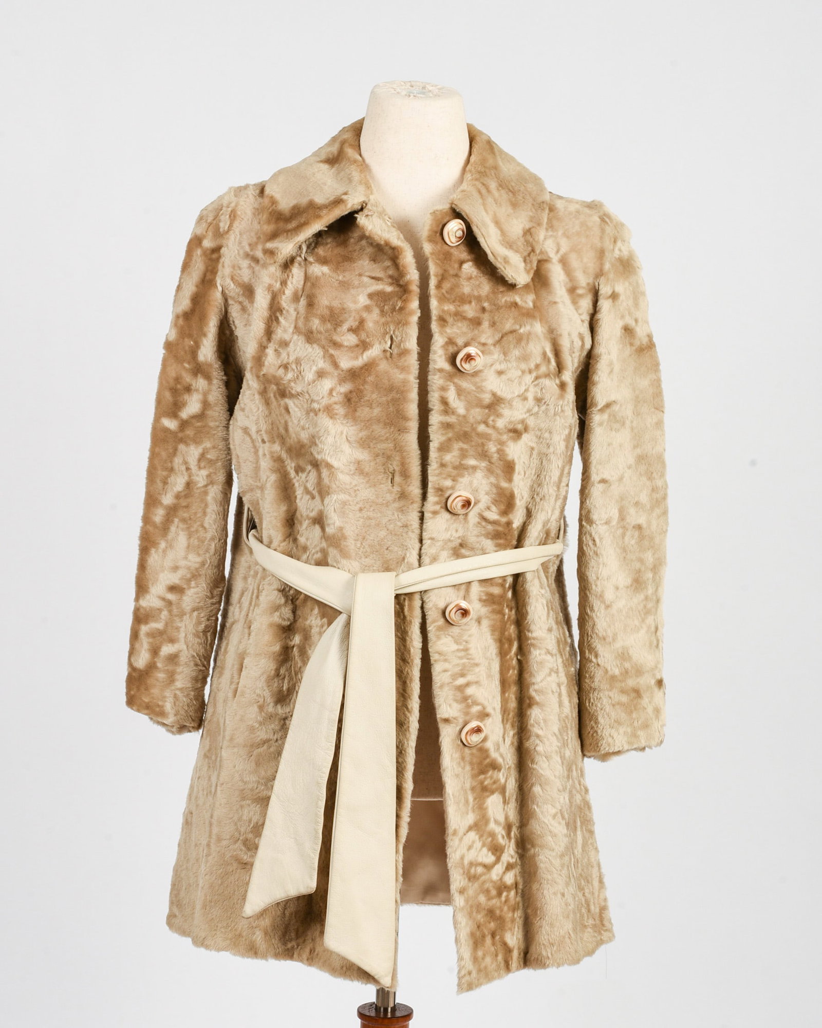 Blond Fur Jacket with Leather Belt: Size x-small, circa 1960's-1970's, with 5 buttons and wide collar, length 32.25 inches, good condition.