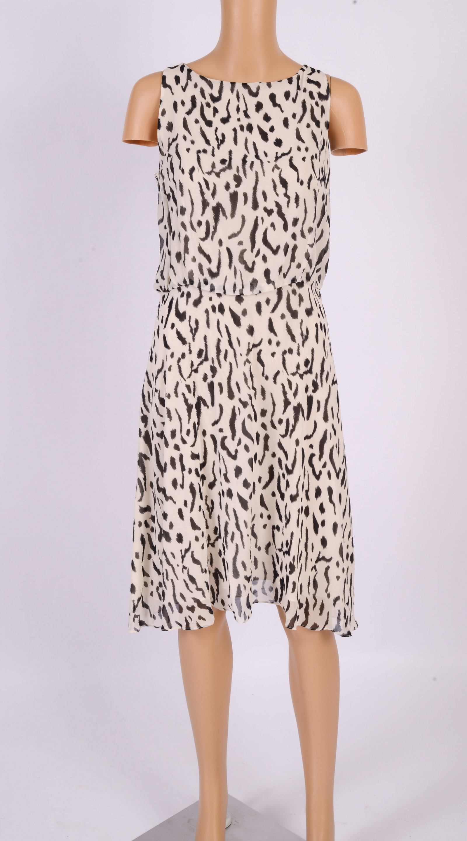 Jack Mulqueen Silk Animal Print Sleeveless Dress: Size 10, with back zipper, length 40 inches, good condition.