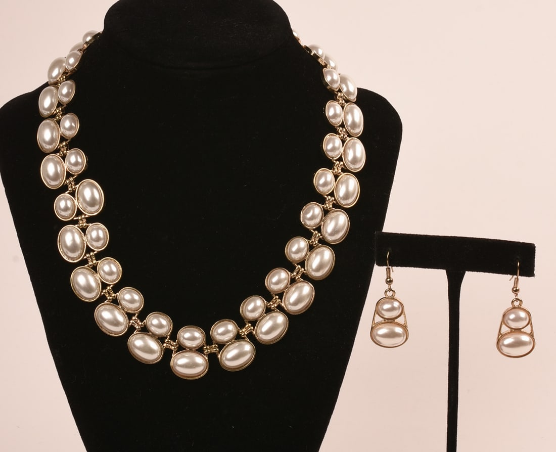 Faux Pearl Necklace Set: With matching dangle earrings, necklace length 18 inches