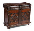 A RARE GEOMETRIC PANELED TWO-PART CHEST