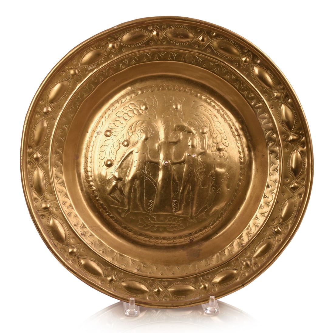 FINE 17TH-CENTURY NUREMBURG BRASS ALMS PLATE WITH ADAM & EVE DECORATION.: Diameter 15.5 inches. Three small holes through tree and Eve's chest, a few small dents.