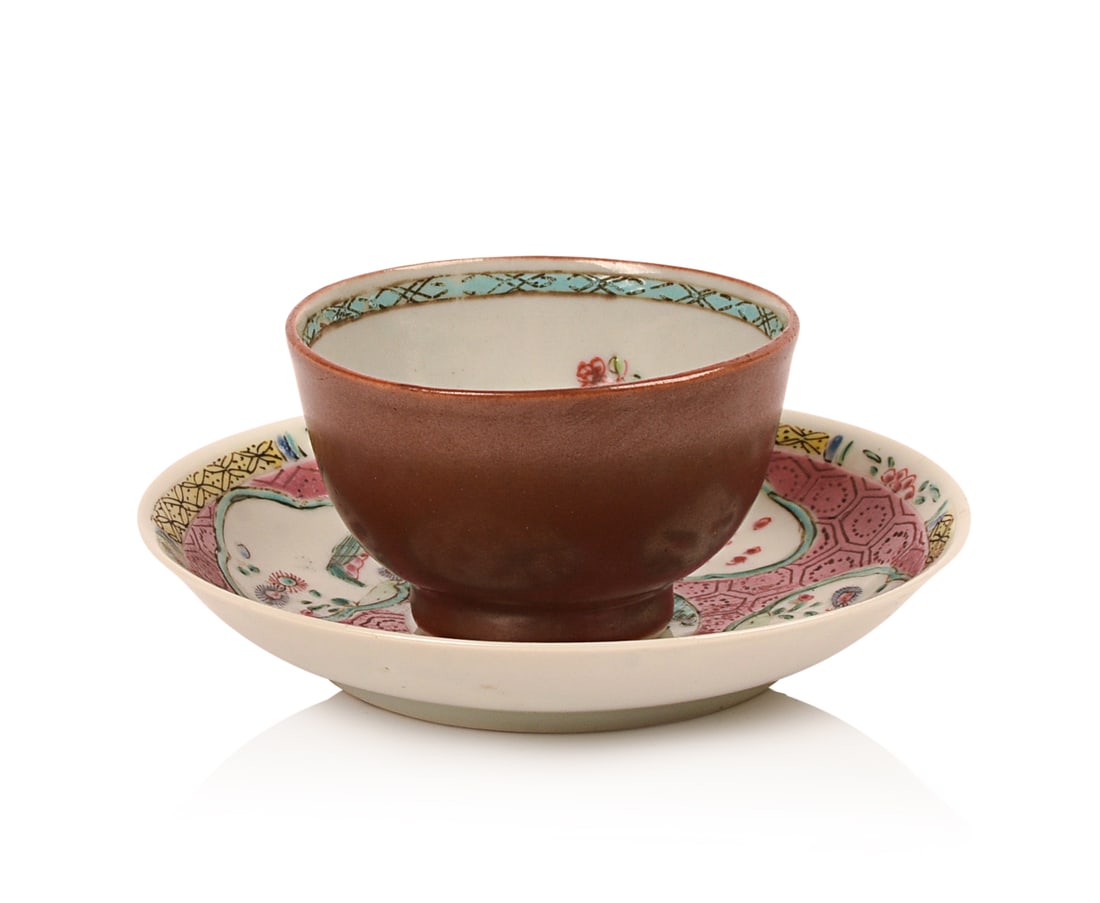 TWO PIECES OF 18TH CENTURY CHINESE EXPORT PORCELAIN: a famille rose wine cup with a cafe au lait exterior and a pink ground saucer with bird decoration. Cup diameter 2.5 inches, saucer diameter 4 inches. Good condition, small chips to foot rim of both p