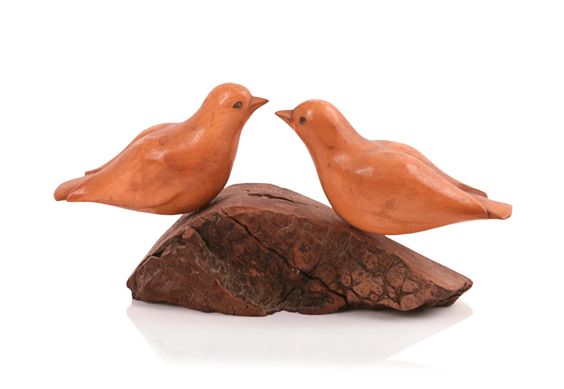 FOLK ART CARVED BIRDS ON A BURLWOOD STUMP, SIGNED HAZEL DOCKERY.: Length 7.5 inches.