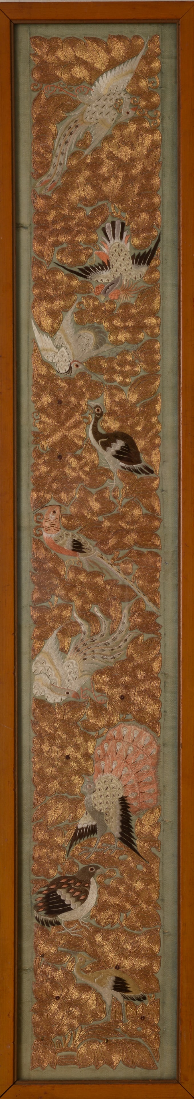 RICHLY EMBROIDERED CHINESE SILK BIRDS SLEEVE BAND.: Finely embroidered with nine birds against a dense gilt thread ground, late 19th/ early 20th century. Width 5 inches, height 27.5 inches framed.